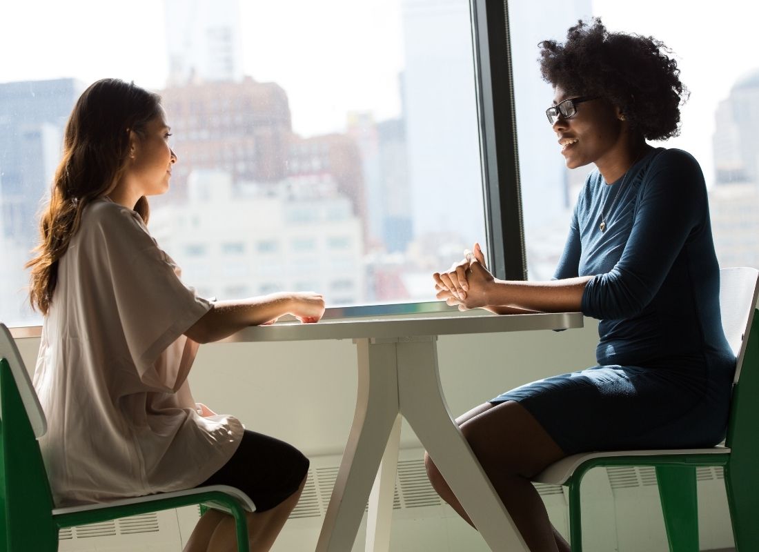 Two women sitting down in a job interview
