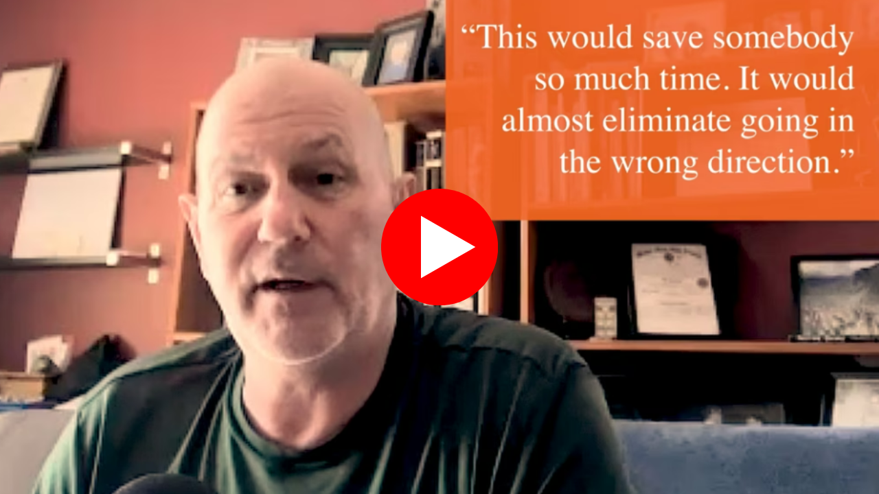 screenshot of Mark Aylward with an orange quote to the right and a red and white play button overlay